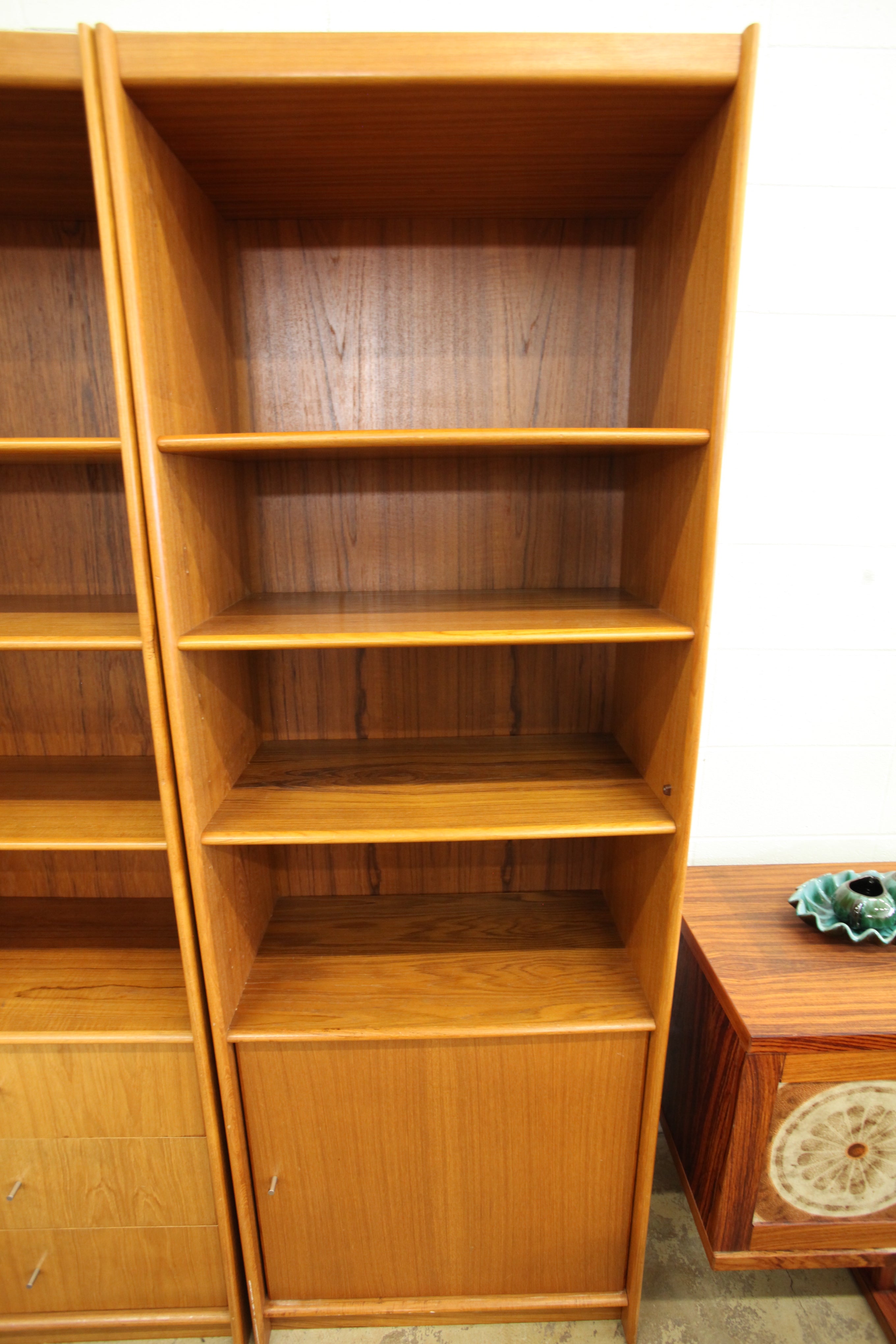 Vintage Tall Teak Bookshelf w/ lower cupboard-right opening (27.5"W x 15.75"D x 78.25"H)