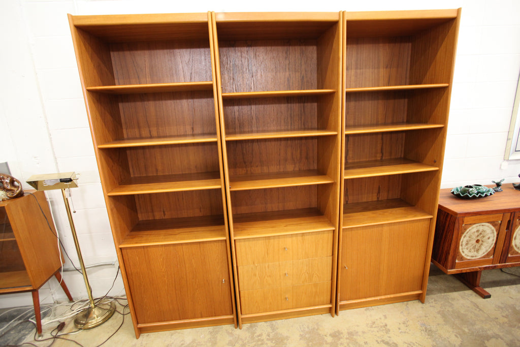 Vintage Tall Teak Bookshelf w/ lower cupboard-left opening (27.5"W x 15.75"D x 78.25"H)