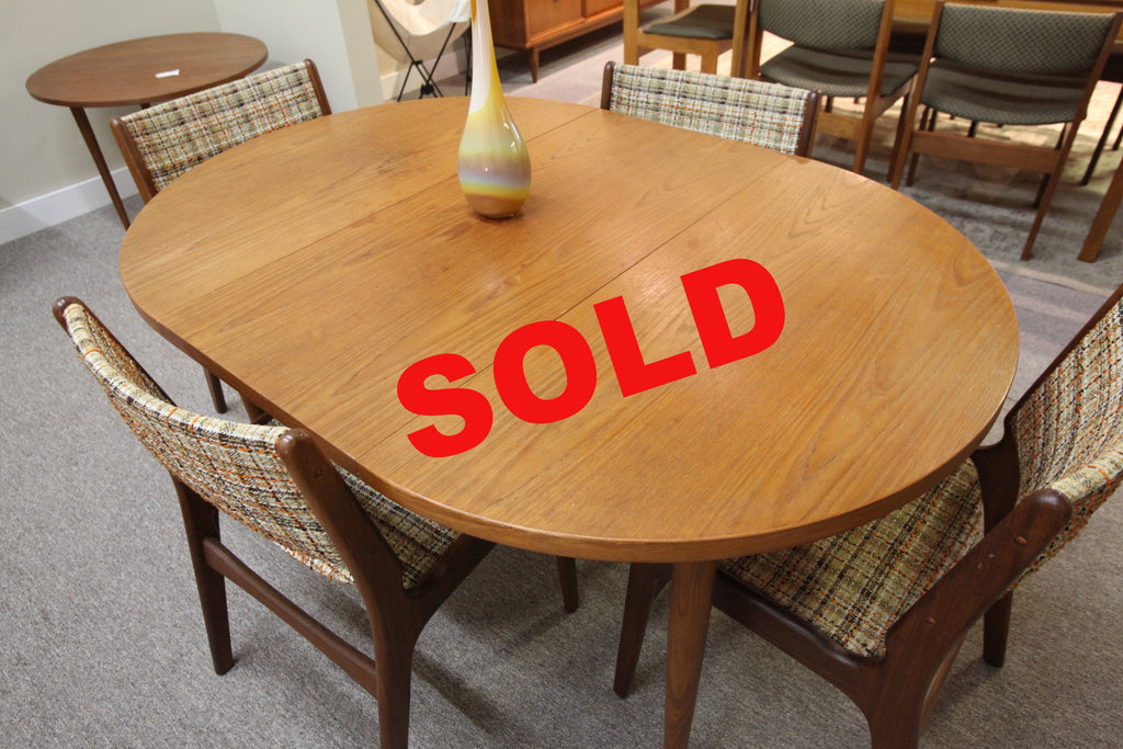 Teak Dining table (58" x 40") or (40" across round)