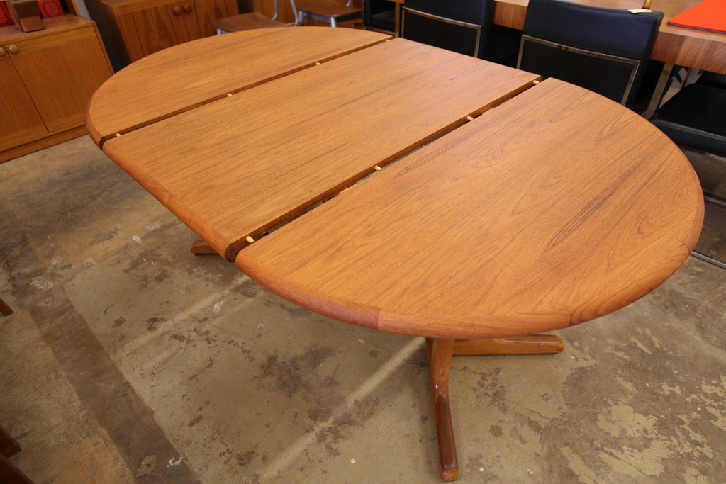 Vintage Round Teak Dining Table with One Leaf (63.5"L x 42"W) (42" Dia Round)