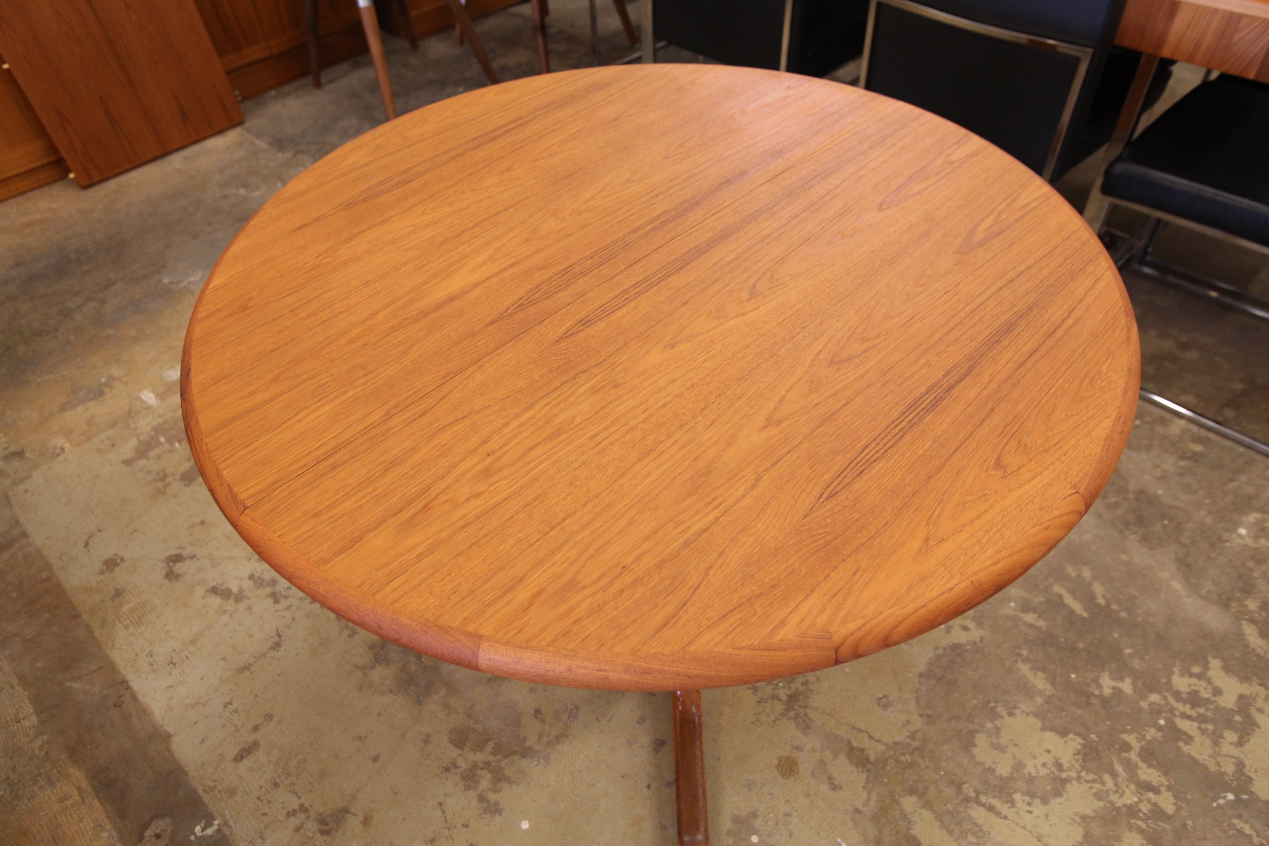 Vintage Round Teak Dining Table with One Leaf (63.5"L x 42"W) (42" Dia Round)