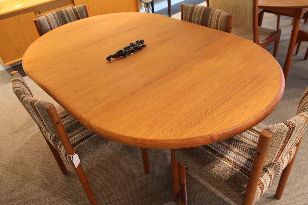 Round Teak Dining Table with one Leaf (63.5"L x 42"W) or (42" round across)