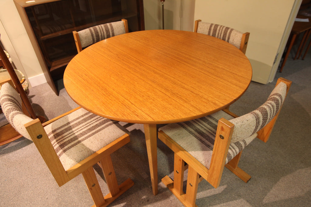 Vintage Round Teak Table w/ one extension (64" x 43") or (43" Round)