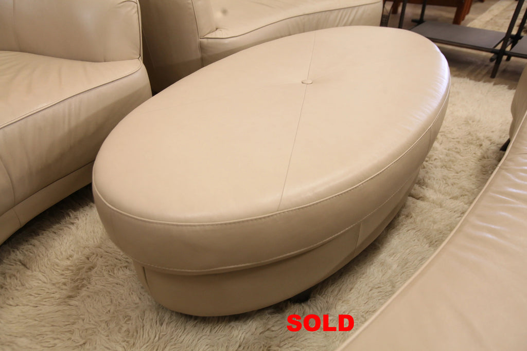 Oval Ottoman in Beige Leather (53" x 29" x 17"H)