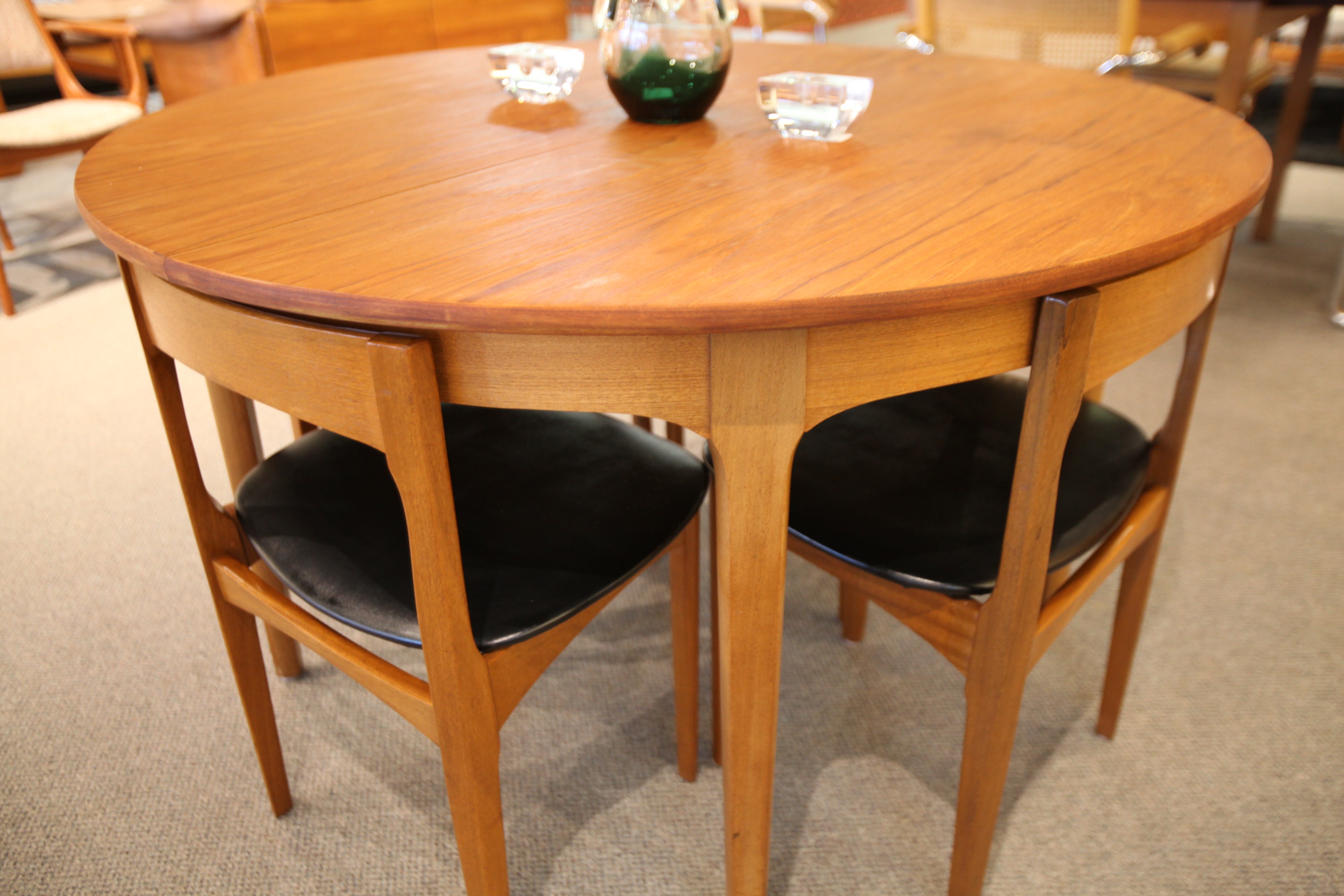 Nathan (England) Teak Dining Table and 4 Chairs (48"Round) or (66"L x 48"W)