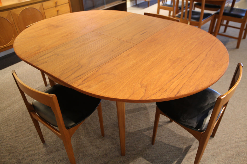 Nathan (England) Teak Dining Table and 4 Chairs (48"Round) or (66"L x 48"W)