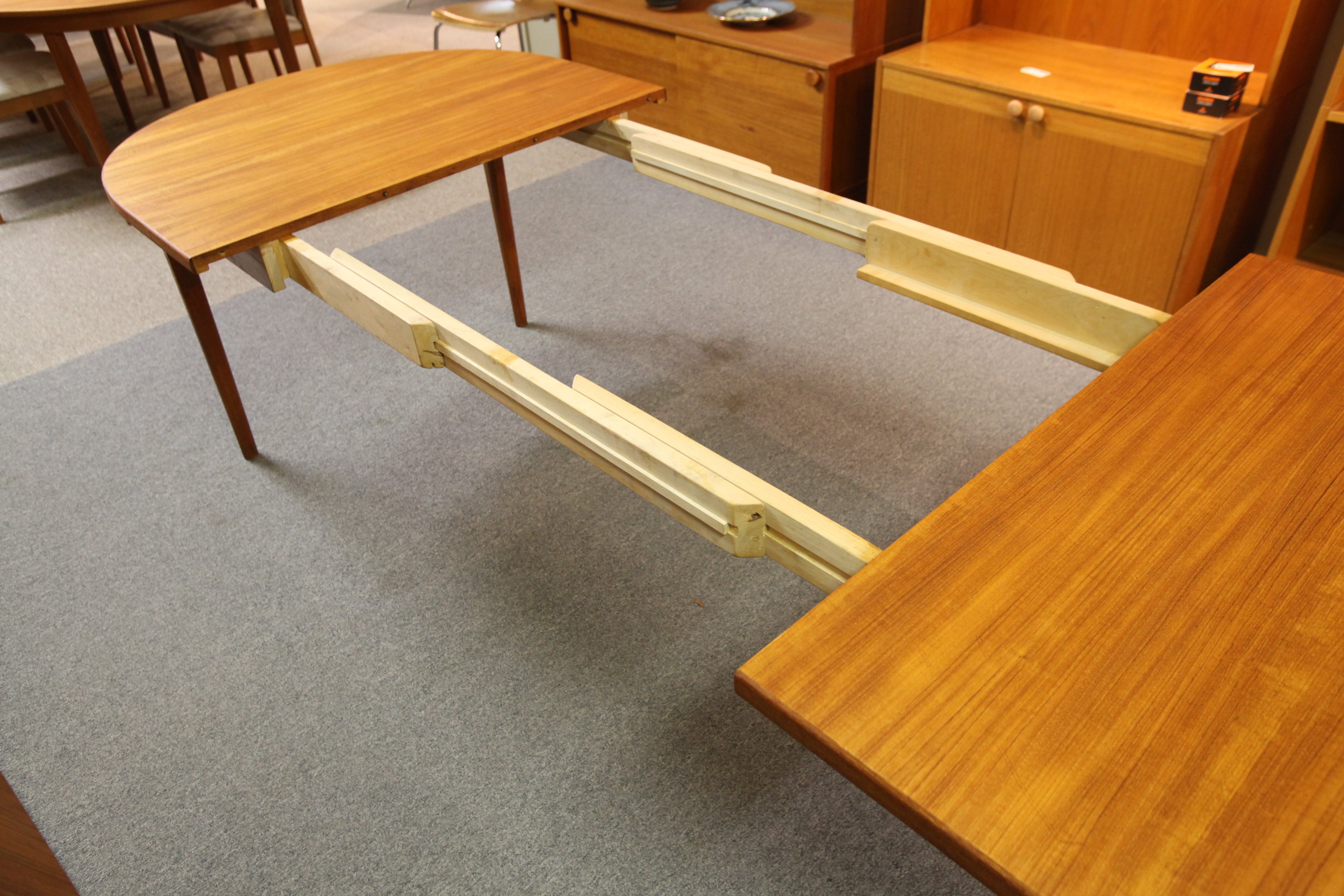 Mid Century Danish Teak Dining Table by Nils Jonsson for Troeds (104" x 39.5") (61"x39.5")